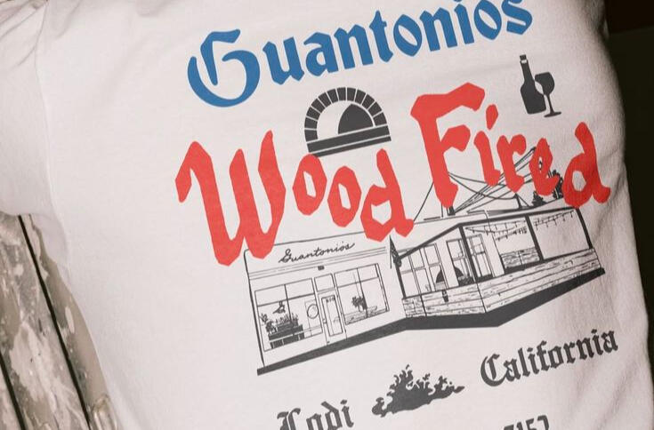 Leroy's House of Merch Logo Leroy's House of Merch logo featuring a small business shop and an old Mercedes-Benz with the company title at the top