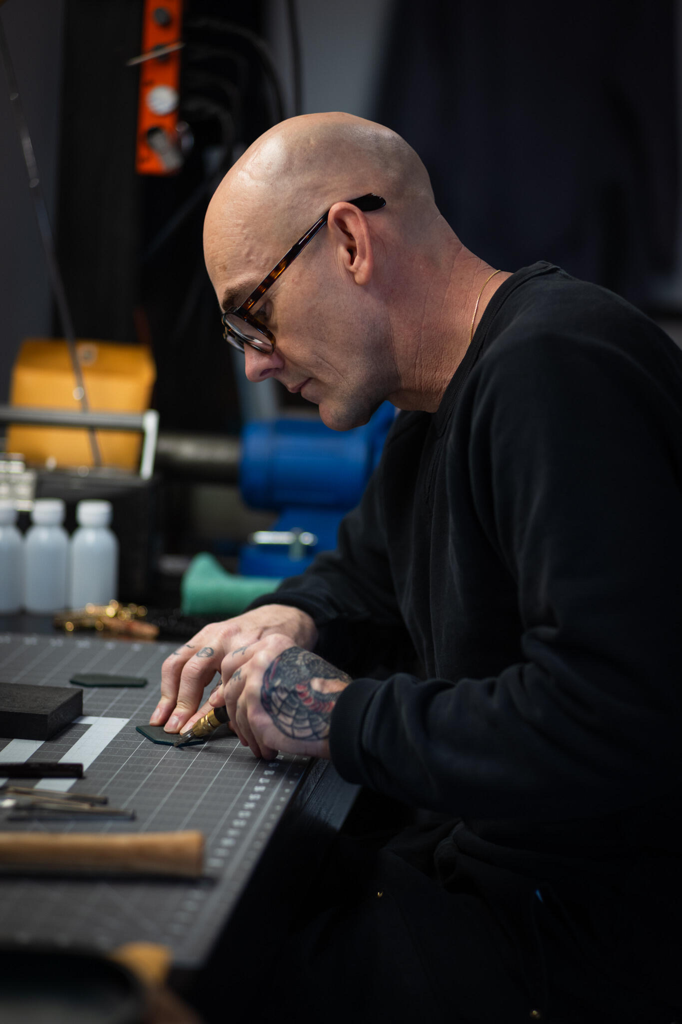 Leroy's House of Merch logo featuring a small business shop and an old Mercedes-Benz with the company title at the top